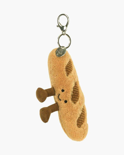 Jellycat Amuseables Baguette Bag Charm featuring a cute, plush baguette with colorful details, perfect for accessorizing bags or backpacks.