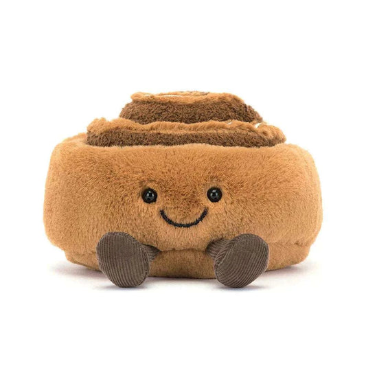 Cute Jellycat Amuseables Cinnamon Bun plush toy with a smiling face and soft, textured details.