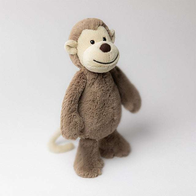 Soft Bashful Monkey Medium plush toy by Jellycat, with a cuddly monkey character and light brown fur, perfect for play and cuddling.