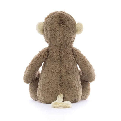 Medium Bashful Monkey plush toy from Jellycat, featuring soft fabric and a cute monkey face, perfect for cuddling.