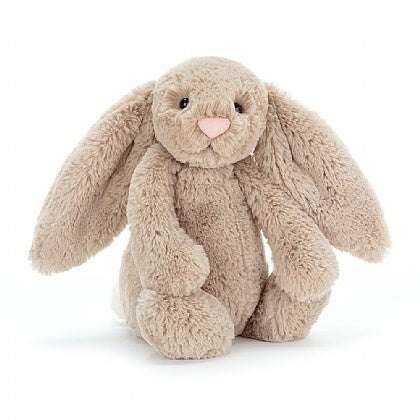 Beige Jellycat Bashful Bunny Medium plush toy with soft fur and floppy ears, perfect for cuddling.